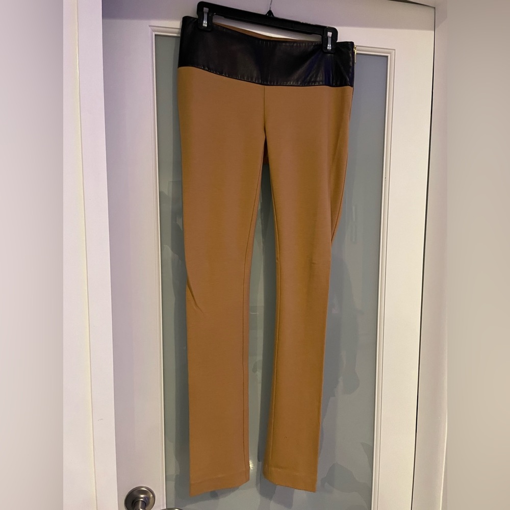 Marciano Black & Tan stretchy pants with leather trim. New condition. Size 6
